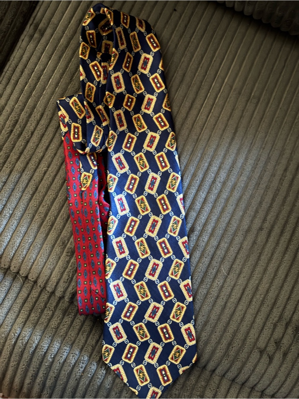 Tommy Hilfiger Navy Tie with Red and Gold Crest Pattern